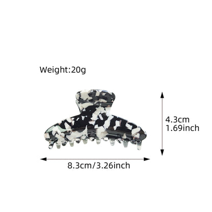 Acetic acid hair claw with leopard print