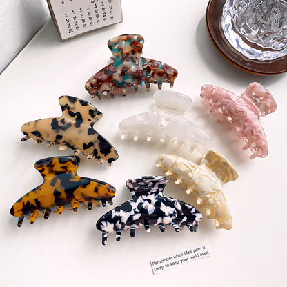 Acetic acid hair claw with leopard print