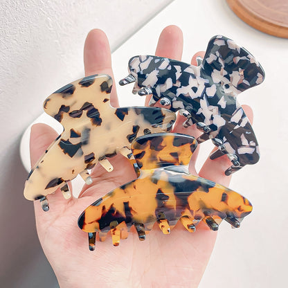 Acetic acid hair claw with leopard print